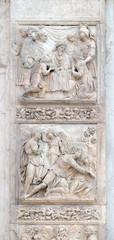 Jacob and the Angel by Niccolo Tribolo up and Benjamin brings the cup to Pharaoh by Francesco da Milano, left door of San Petronio Basilica in Bologna, Italy