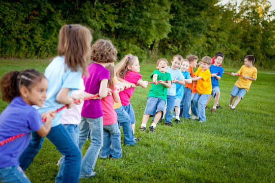 Girls Versus Boys Tug-of-War Team Game Outside