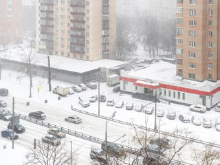 view of street in residential quarter in snowfall