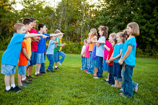 Boys and Girls Teasing and Laughing at Each Other