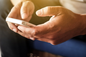 close up image of Phone on hands.