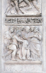 Fototapeta na wymiar The brothers show Joseph's clothes to Jacob, panel by Girolamo da Trevisio on the right door of San Petronio Basilica in Bologna, Italy