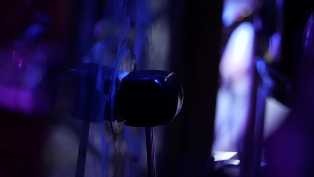 Close-up of a kick drum or bass drum as the mallet hits the drumhead during a live concert on stage.