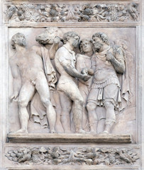 Fototapeta na wymiar The Story of Joseph and His Brethren by Amico Aspertini, right door of San Petronio Basilica in Bologna, Italy