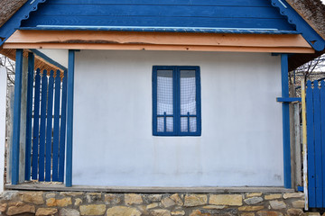 Obraz premium House outdoor decoration in Jurilovca village ,an important fishing center in Danube Delta area and tourists attraction in Tulcea, Romania