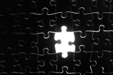 One piece missing black jigsaw puzzle