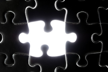 One piece missing black jigsaw puzzle