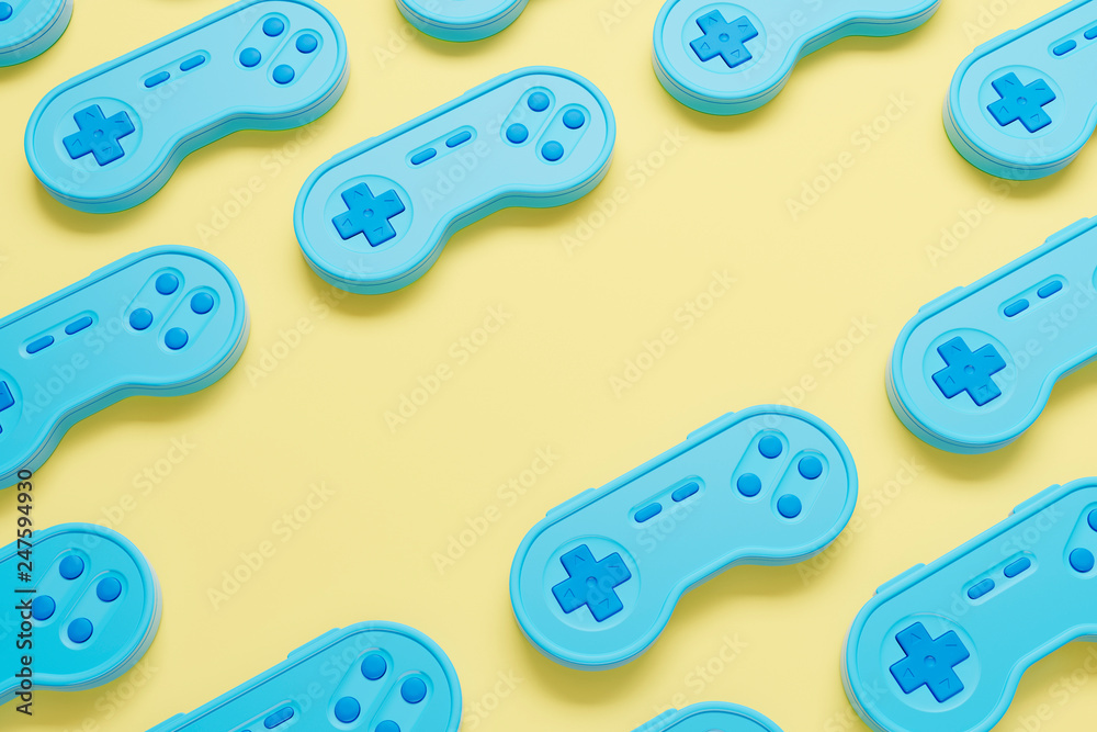 Wall mural background made of blue retro gamepad on the yellow table. top view. 3d render