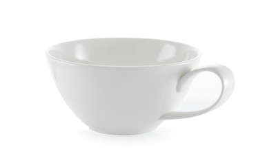 white ceramic cup on white background