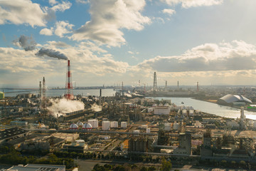 Oil refinery industrial and chemical factory plant with blue sky.