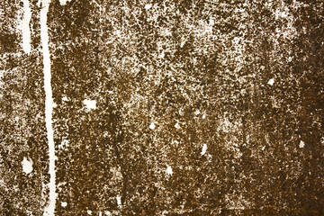 old rusty sheet of iron with white spots of paint. rough surface texture
