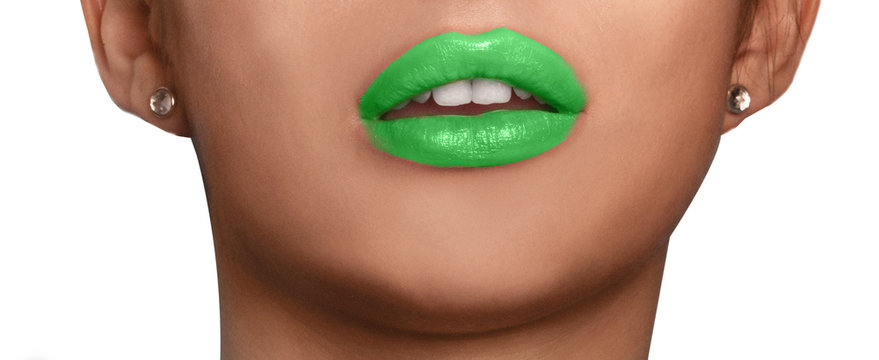 close up photo of lips with green lipstick color 