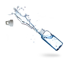 Water splash from a plastic water bottle isolate on white background