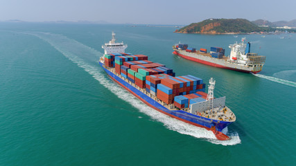 Aerial view container ship going to sea port for unload container. Logistic, import export,...