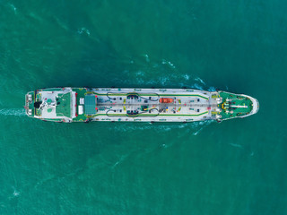 Aerial top view Oil ship tanker transportation oil from refinery on the sea.