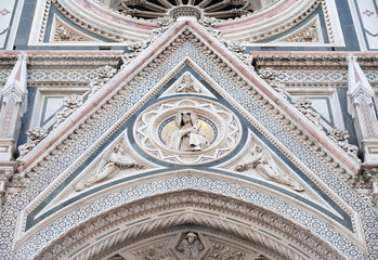 Our Lady of Sorrows supported by Angels bearing Flowers, Portal of Cattedrale di Santa Maria del Fiore (Cathedral of Saint Mary of the Flower), Florence, Italy 