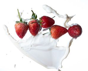 Strawberry milk splash isolated on white background