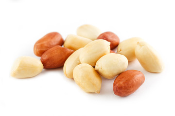 Peanuts isolated on white background. Peeled Peel and Scarlup.