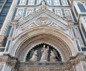 Portal on the side-wall of Cattedrale di Santa Maria del Fiore (Cathedral of Saint Mary of the Flower), Florence, Italy 