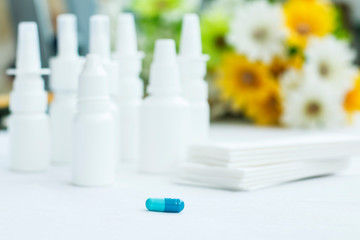 spray and drops from a cold on a white background