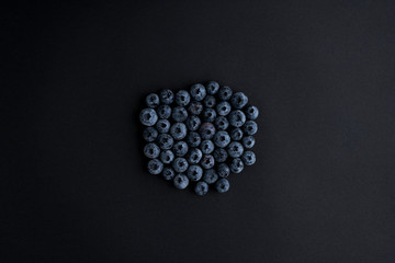 Blueberry On Black Background