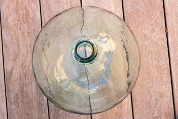 Green demijohn upside view
