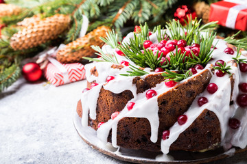 Christmas fruit cake, pudding on gray background. New Year pastries Holidays Concept Copy space for Text..