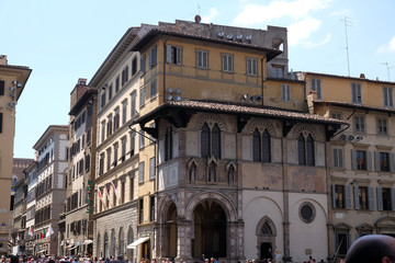 Fototapeta na wymiar Loggia del Bigallo on Piazza San Giovanni in Florence, Italy