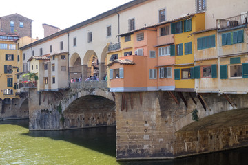 Fototapeta na wymiar Medieval stone bridge Ponte Vecchio and the Arno Rive in Florence, Tuscany, Italy