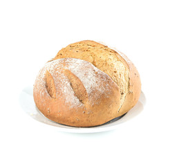 round brown loaf of bread with flour sprinkled on top on a white plate on white background