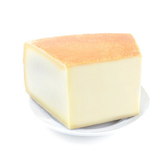 piece of cheese on white plate on white background