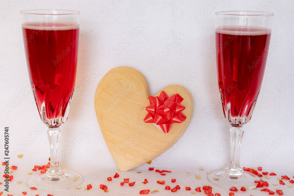 Wall mural heart gift with two glasses of bubbly