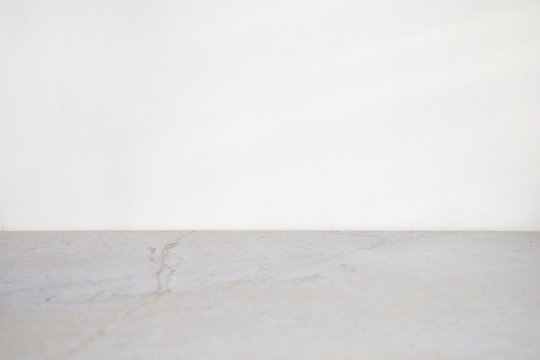 White and grey marble background with copy space. Minimal concept. Side view