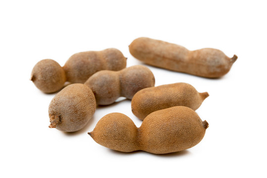 Ripe sweet tamarind isolated on white background