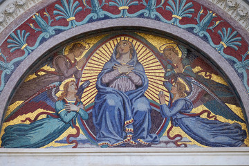 Mosaic by Giuseppe Modena da Lucca, of the Virgin Mary, above the middle door of Cathedral in Pisa, Italy. Unesco World Heritage Site