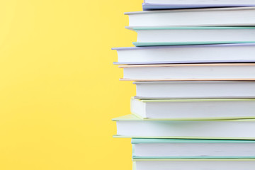 Stack of colorful books. Education background. Back to school. Copy space for text