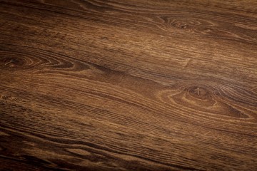 Clean dark wooden table surface.