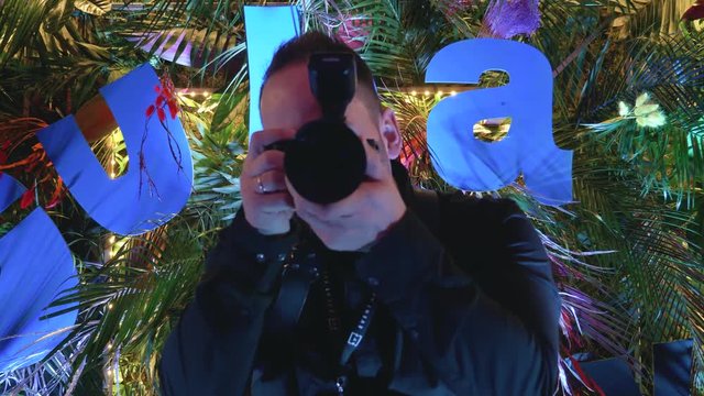Photographer make shot at a cuba party