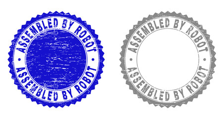 Grunge ASSEMBLED BY ROBOT stamp seals isolated on a white background. Rosette seals with distress texture in blue and grey colors.
