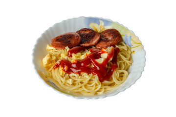 spaghetti with sausage in a plate on a white background