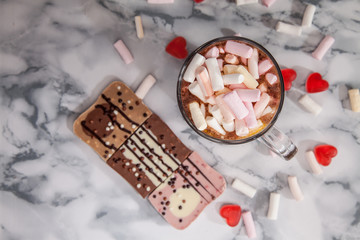 Handmade fine cappuccino with marmalade and marshmallows and decorated chocolate