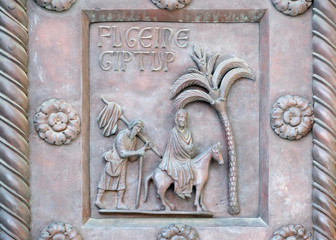 Flight to Egypt on the San Ranieri gate of the Cathedral St. Mary of the Assumption in Pisa, Italy