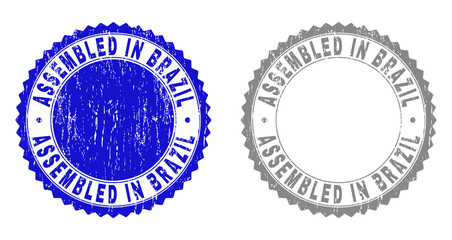 Obraz premium Grunge ASSEMBLED IN BRAZIL stamps isolated on a white background. Rosette seals with grunge texture in blue and grey colors. Vector rubber imitation of ASSEMBLED IN BRAZIL title inside round rosette.