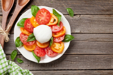 Caprese salad with tomatoes, basil and mozzarella