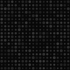 Abstract seamless pattern of small circles or pixels in various sizes in gray and black colors