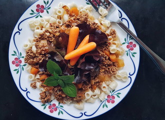 A plate with pasta bolognese