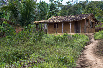 Conde, Bahia, Brazil, August 22, 2013. House of clay built and stick a pike and paja clay, in the rural area of Conde, north coast of Bahia State
