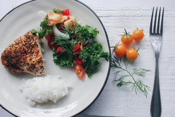 A plate with chicken and rice