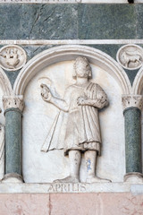 April, detail of the bas-relief representing the Labor of the months of the year, Cathedral of St Martin in Lucca, Italy