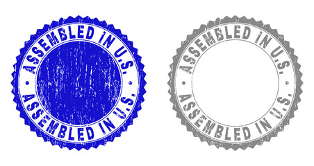 Obraz premium Grunge ASSEMBLED IN U.S. stamp seals isolated on a white background. Rosette seals with grunge texture in blue and grey colors. Vector rubber watermark of ASSEMBLED IN U.S. text inside round rosette.